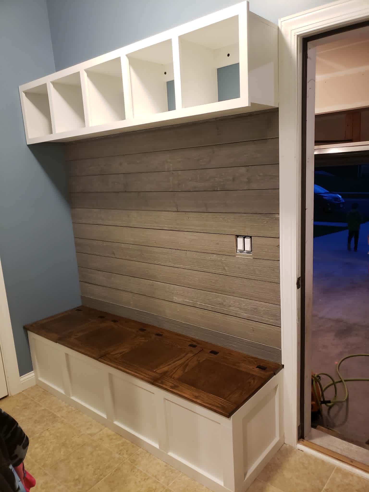 Custom mudroom built-in with lockers and bench seating