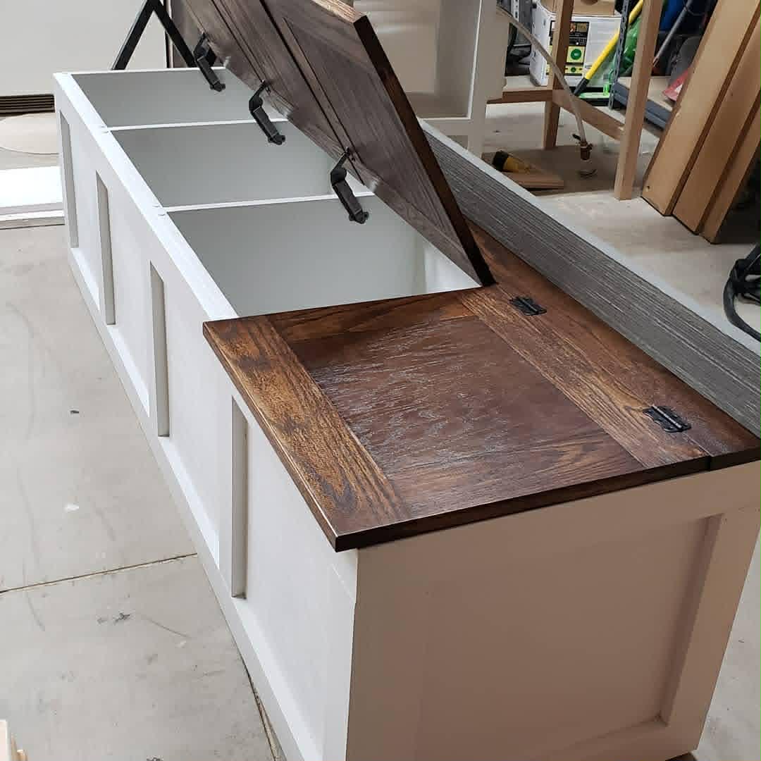 Built-in storage bench with lift-top lids